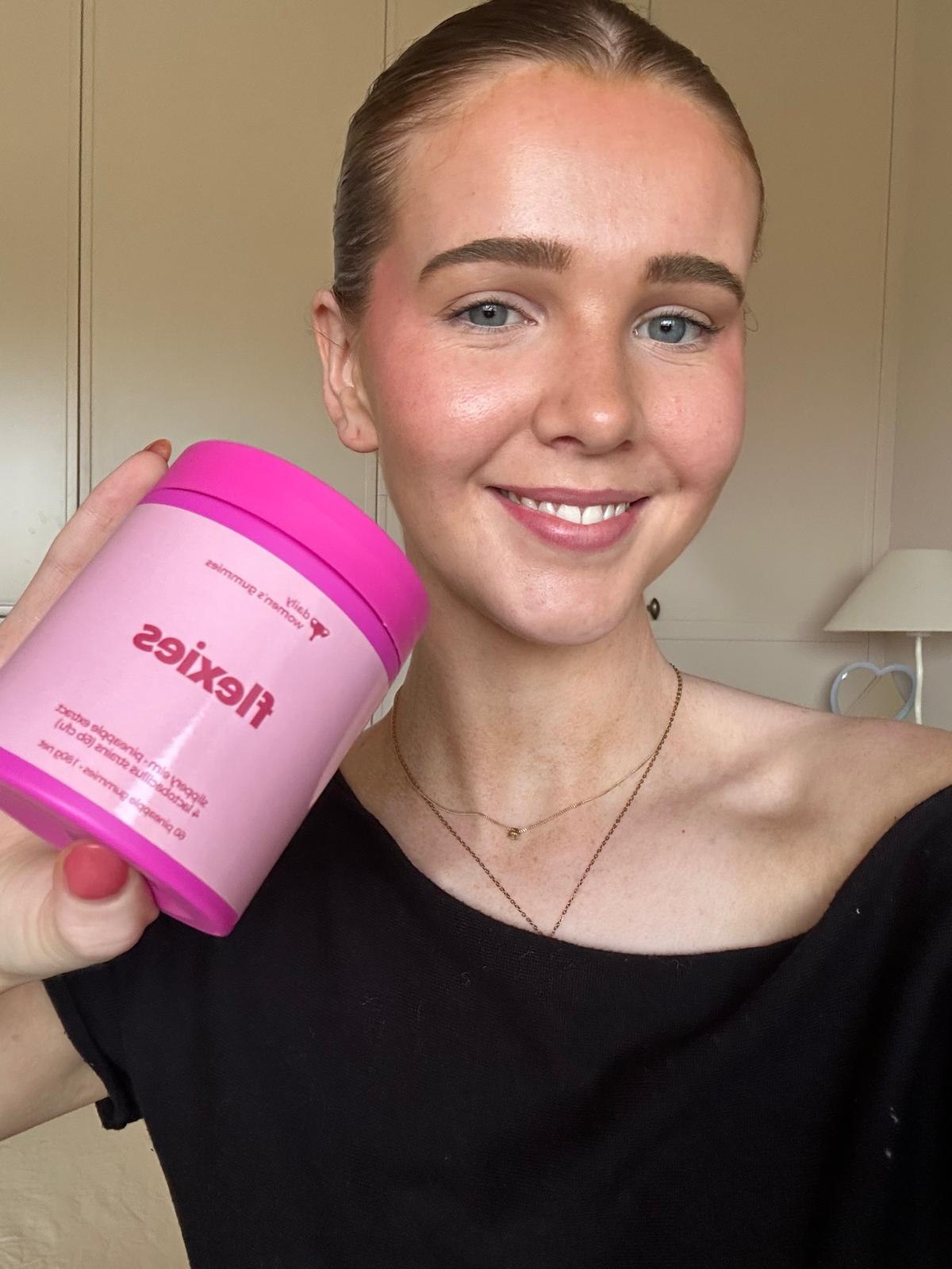 Customer showing off her Flexies probiotic gummies